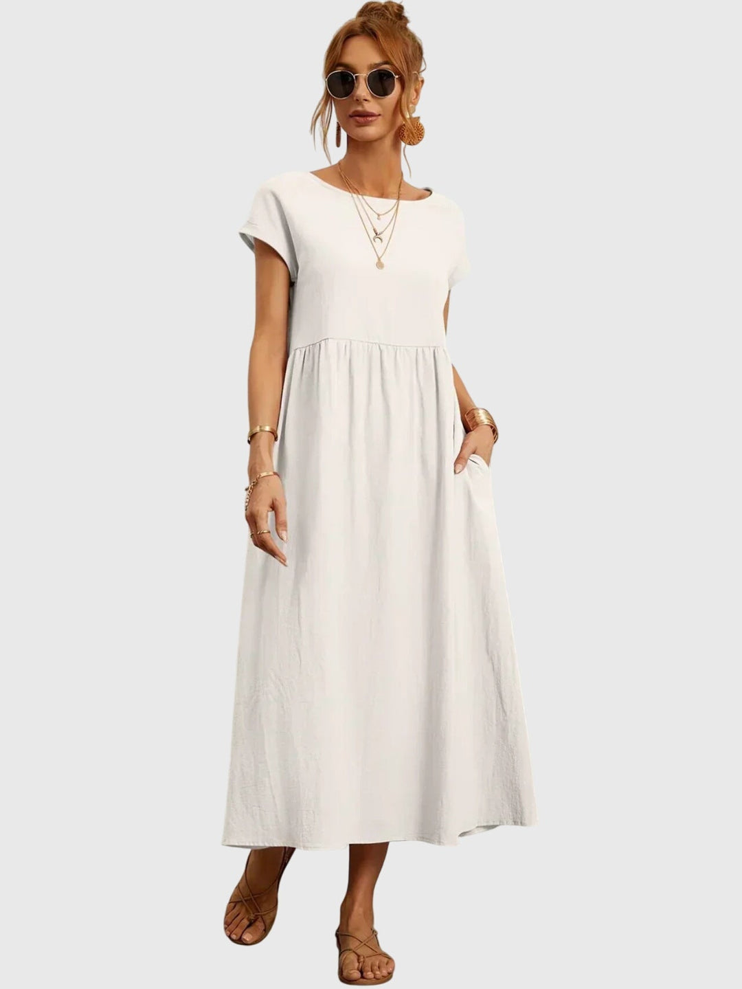 Soft fabric midi dress for women, a comfortable casual pocket dress in a versatile solid color for summer.