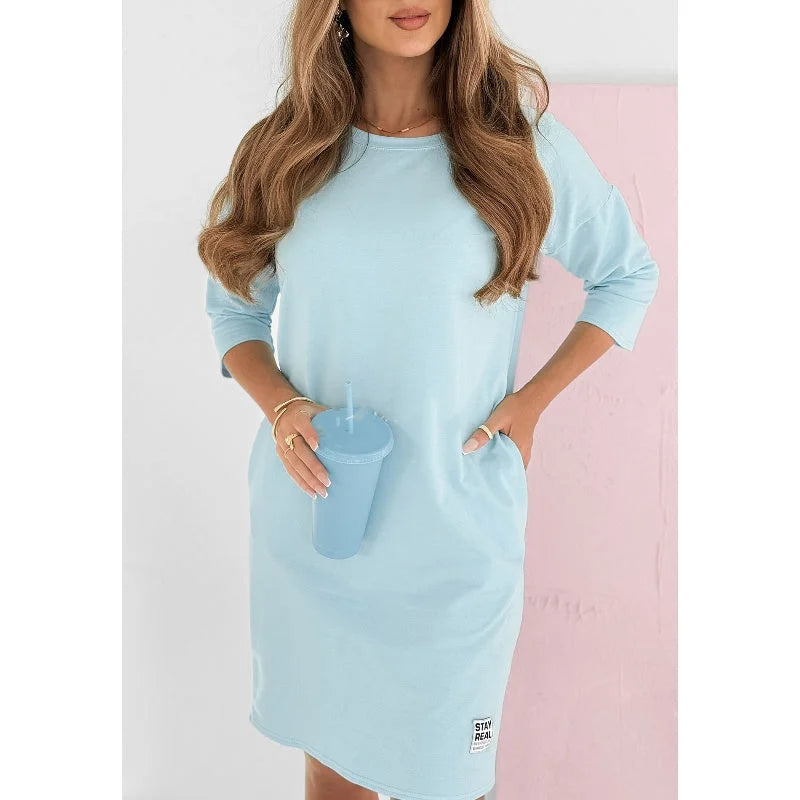 Versatile women's casual mini dress with 3/4-sleeve & crew neck. A comfortable short dress for everyday fashion.