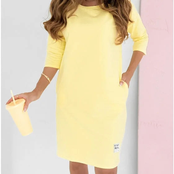 Lightweight women's casual mini dress, 3/4-sleeve & crew neck. Essential everyday fashion for summer & spring comfort.