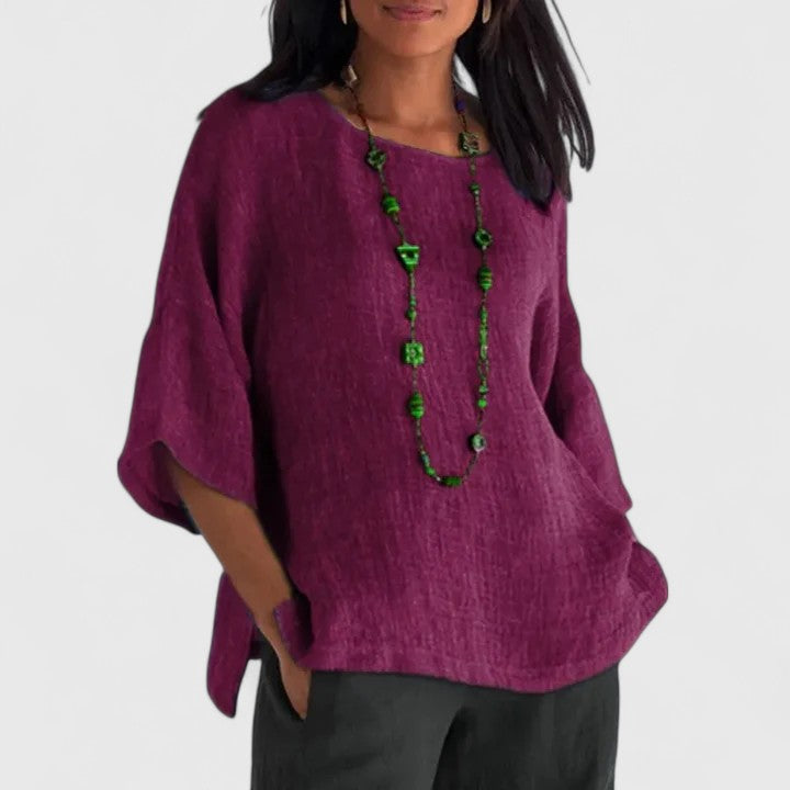 Blue casual O-neck tunic blouse for women, featuring a comfortable loose fit and three-quarter sleeves.