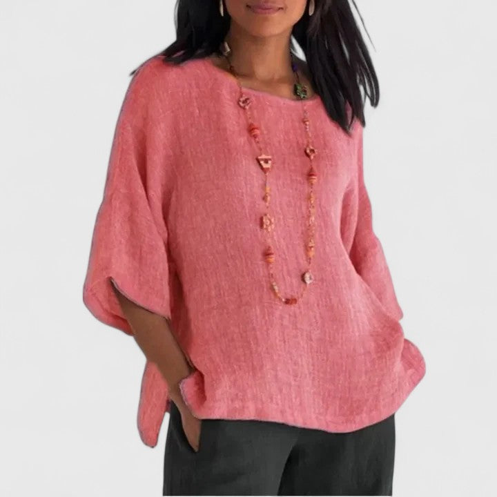 Pink women's summer shirt, an O-neck tunic blouse with three-quarter sleeves, great for casual everyday wear.