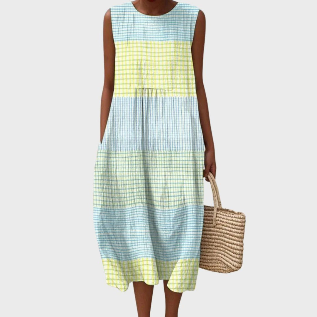 Women's casual plaid sleeveless midi dress with tiered skirt, perfect for summer beachwear or vacation.