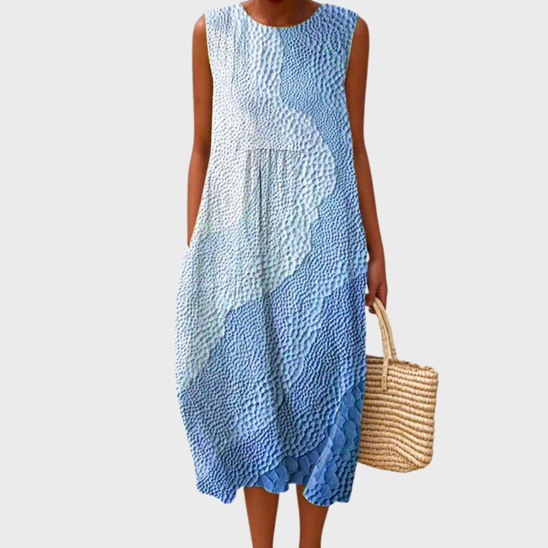 Stylish women's tiered plaid sleeveless midi dress. A comfortable and casual summer dress, great for vacation or beach.
