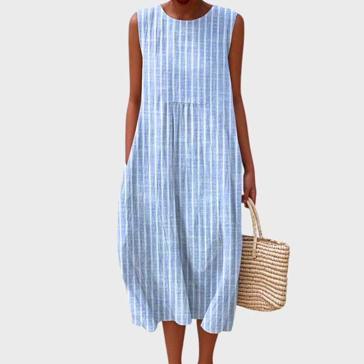 Casual women's plaid sleeveless midi dress. An elegant yet comfy summer dress, perfect for beach days or relaxed outings.
