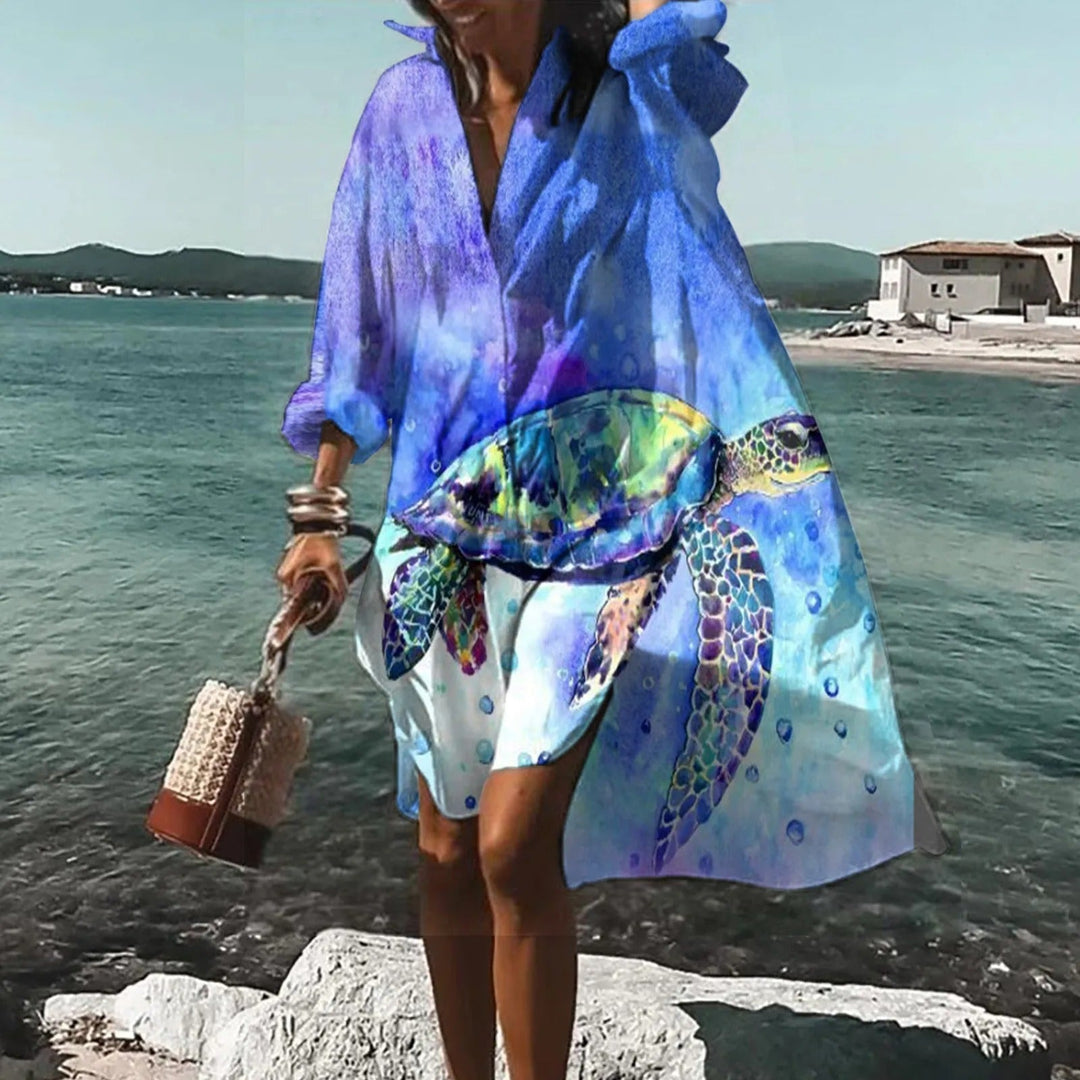 Relaxed fit women's printed midi shirt dress, ideal vacation outfit & beachwear.