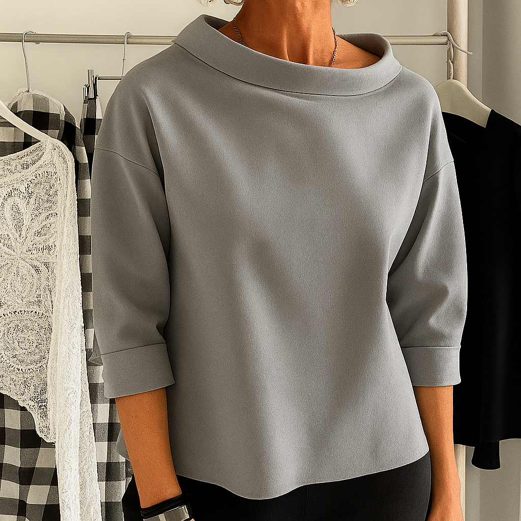 Women's spring pullover sweatshirt featuring a chic half collar. Comfortable, relaxed fit, long sleeve top for casual wear.