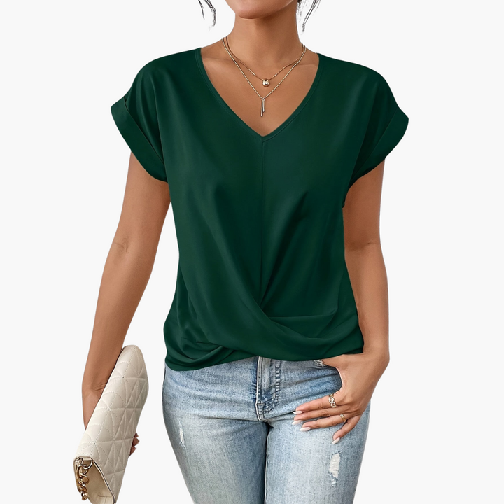 Model wearing a stylish women's casual t-shirt with a heart neckline, paired for effortless everyday wear.