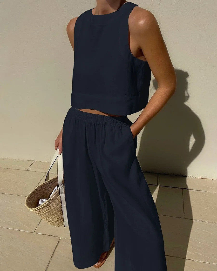 Women's sleeveless top paired with capri pants. A comfortable, casual two-piece set for chic summer and vacation style.