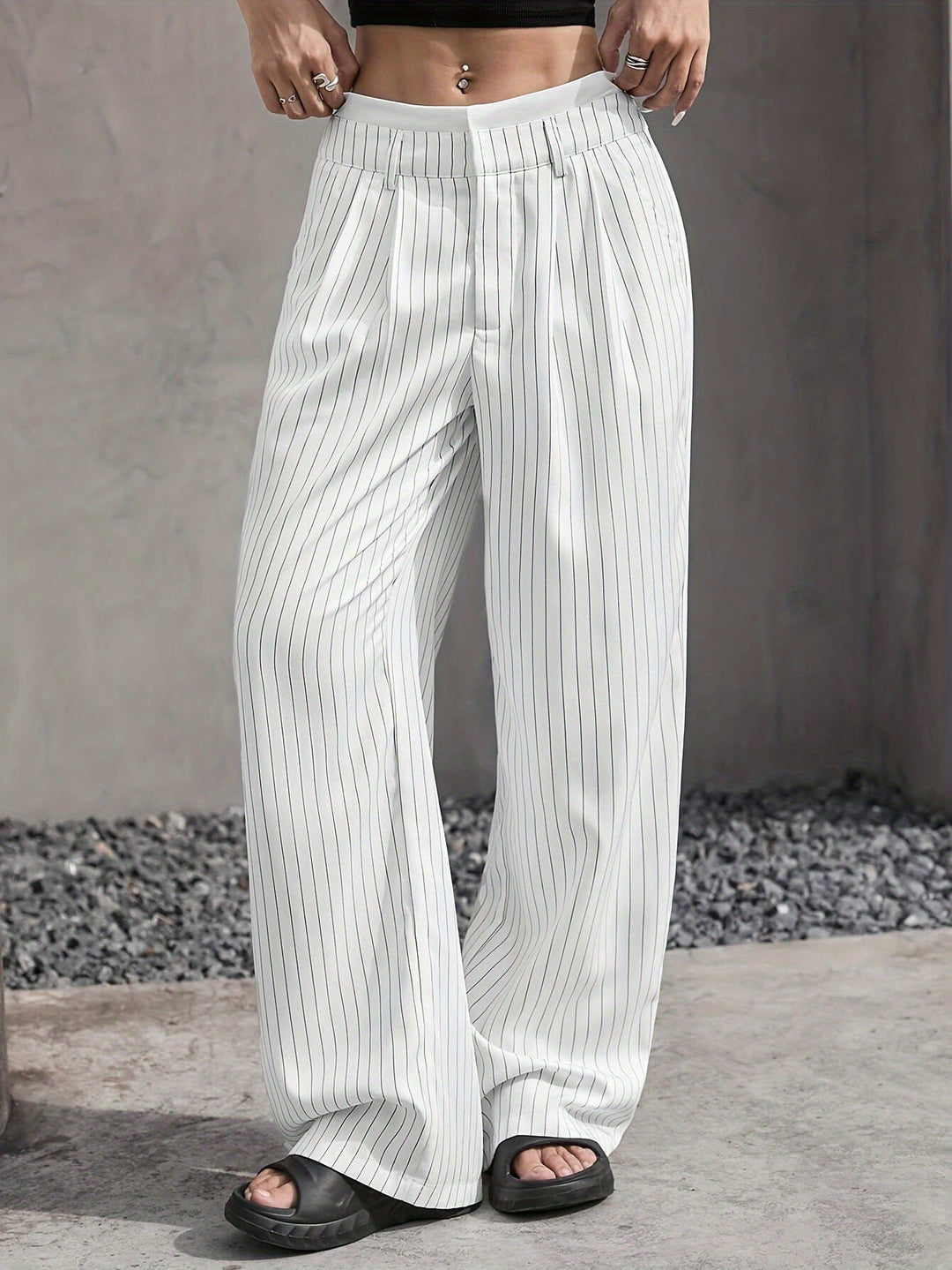 Modern women's striped wide leg trousers, high-waisted for a flattering silhouette and comfort.