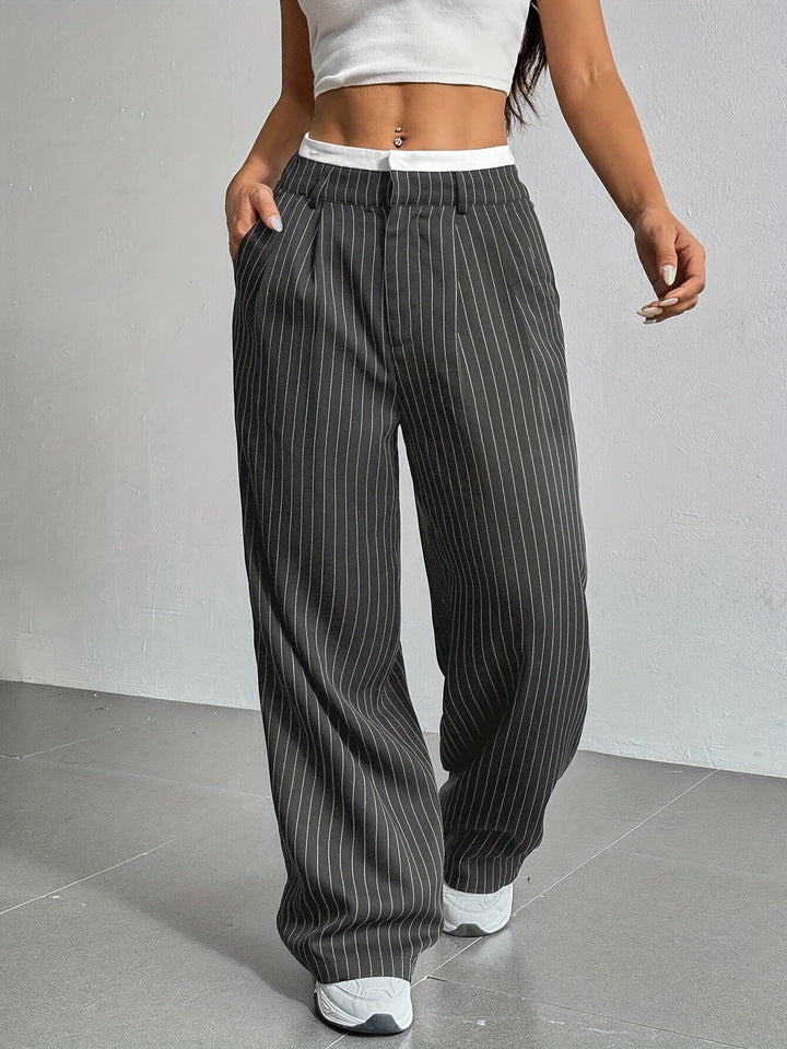 Elegant women's high waist wide leg striped trousers for a modern, sophisticated outfit.