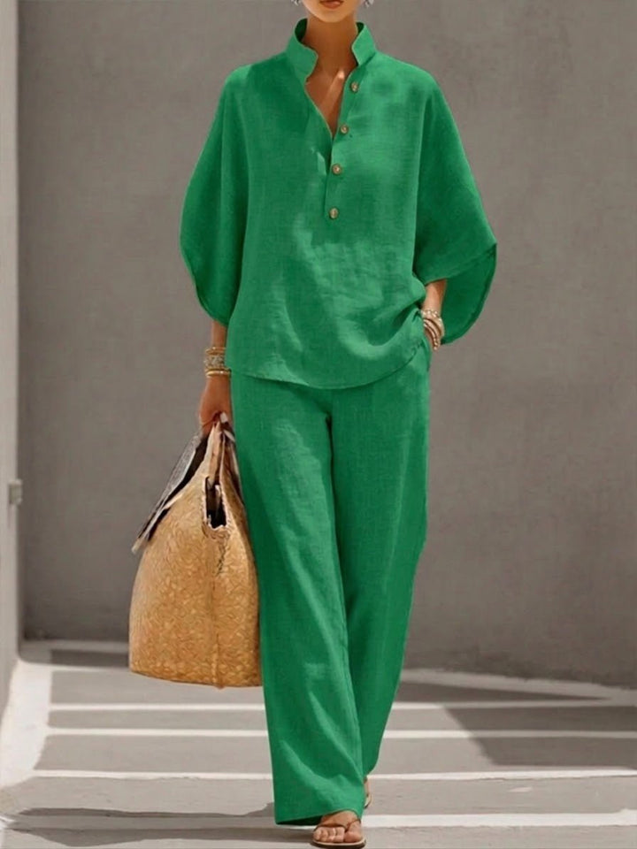 Stylish women's spring/summer co-ord set: batwing top & wide-leg trousers, perfect for relaxed casual wear.