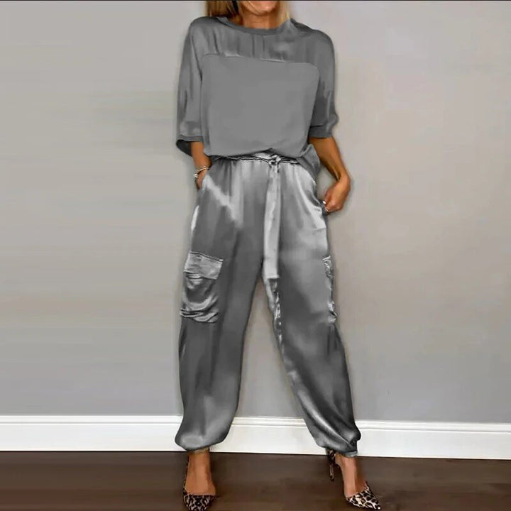 Stylish women's casual fashion set: matching top & straight-leg utility pocket trousers with drawstring waist.