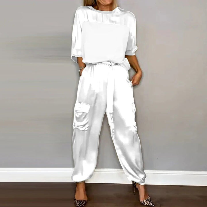 Women's versatile two-piece casual outfit with drawstring waist utility pocket trousers and a relaxed top.