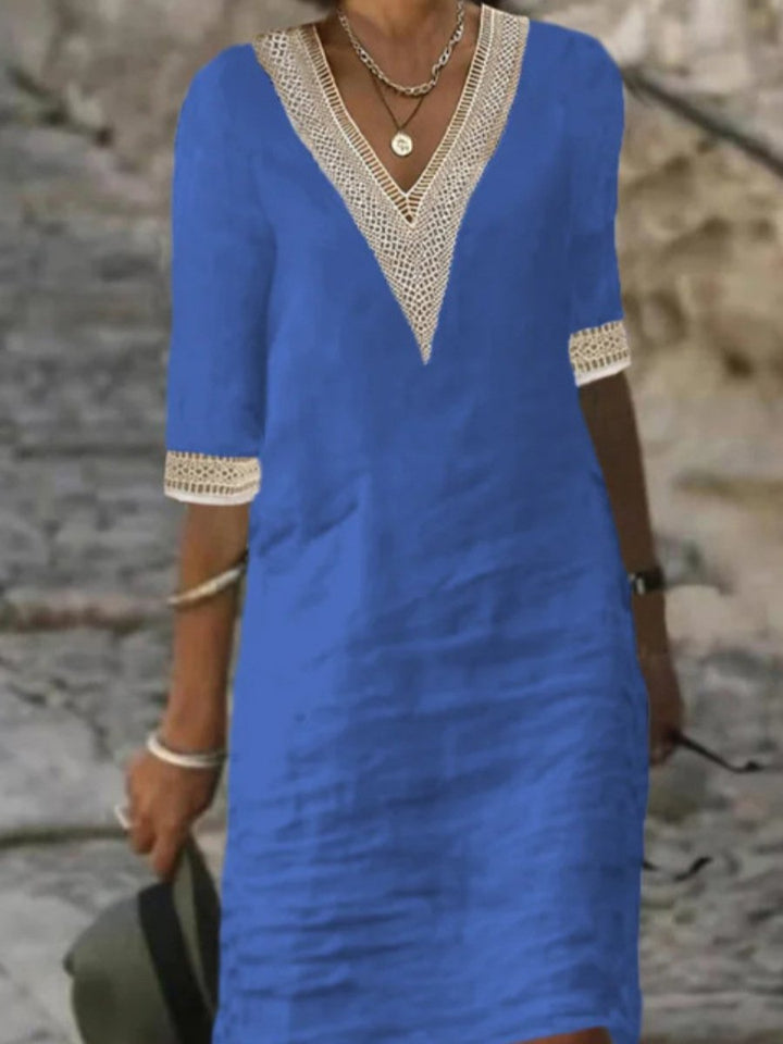 Relaxed fit women's knee-length dress with 3/4 sleeves, ideal for spring & summer casual comfort.
