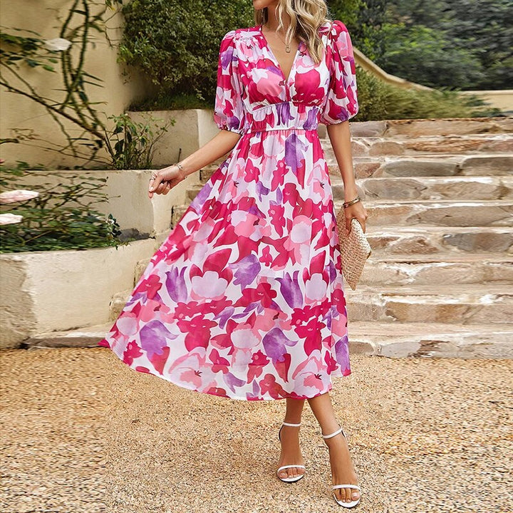 Close-up of a women's V-neck midi dress fabric, highlighting its comfortable, casual summer appeal.