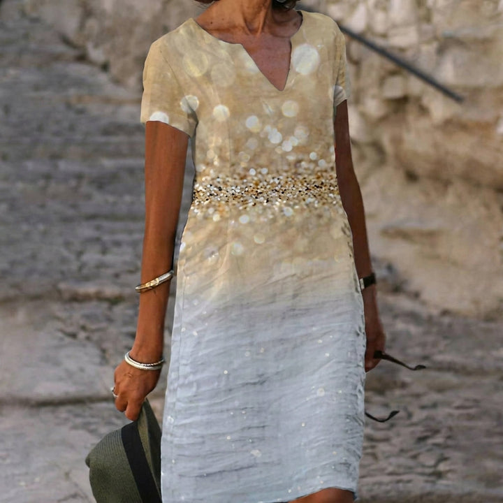 Soft women's casual V-neck midi dress with short sleeves. Comfortable, relaxed fit for versatile spring & summer fashion.