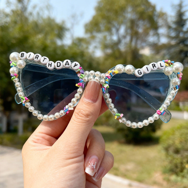 Women's cat-eye sunglasses with pearl accents, perfect for a birthday girl party.