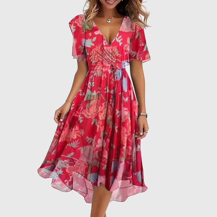 Comfortable Women's Catalina Chic Midi Dress featuring a flattering V-neck and delicate flutter sleeves.