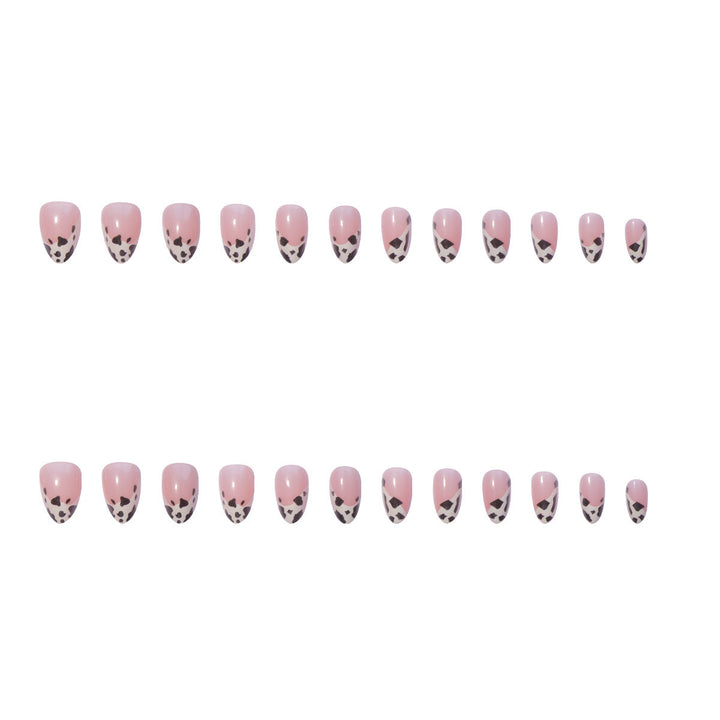Easy-apply animal print press-on nails for women. Chic fake nail art set, perfect for a quick fashion upgrade.