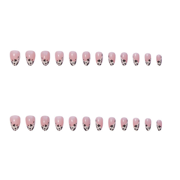 Women's stylish animal print press-on nails. Fashion-forward fake nail set, perfect for chic and glamorous looks.