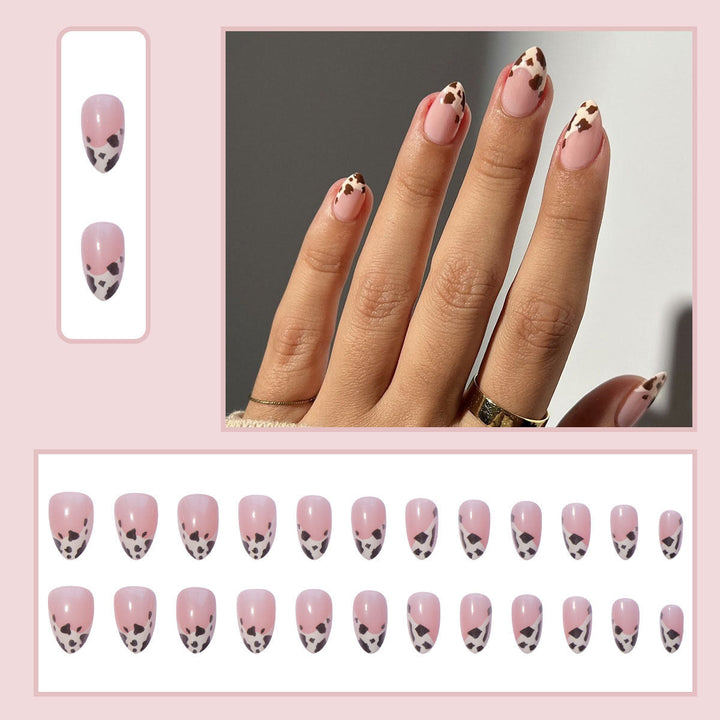 Black animal print press-on nails for women. Chic fake nail art for a glamorous touch. Easy to apply and remove.