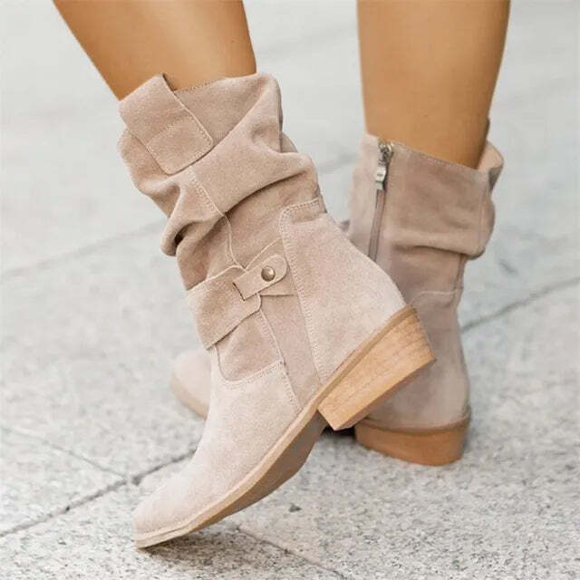 Chic women's ankle slouch boots, a stylish footwear choice with a versatile low heel and fashionable slouch design.