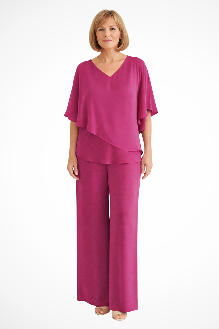 Women's casual two-piece set: trendy batwing top and comfortable wide-leg trousers. Summer fashion.