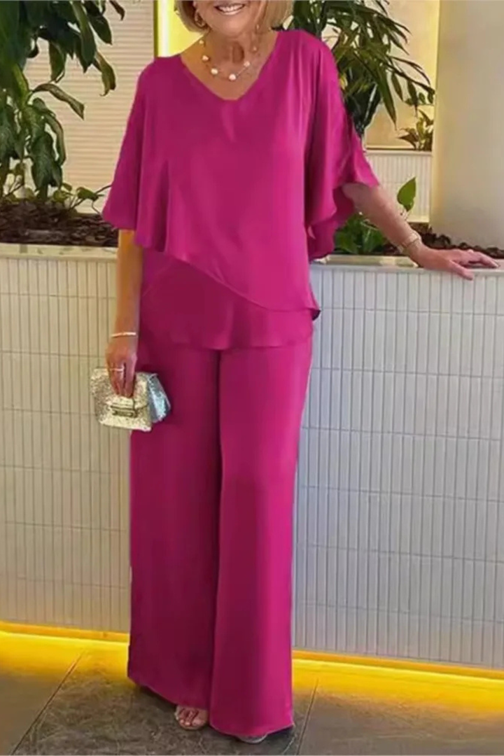 Relaxed fit women's batwing top & wide leg trousers set. Stylish and versatile for any occasion.