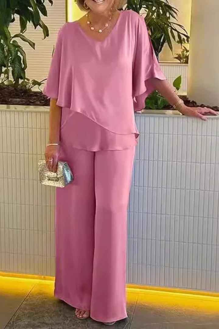 Stylish women's coordinated set: batwing sleeve top & wide leg trousers. Perfect summer outfit.