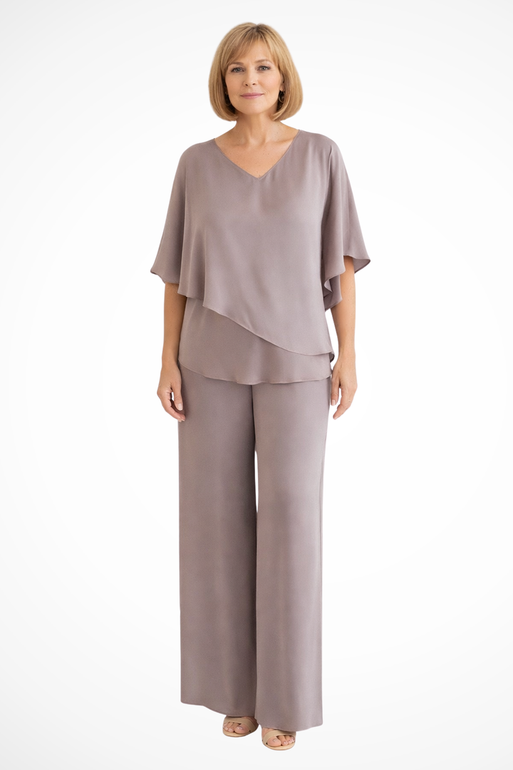 Chic women's two-piece set with a batwing top and wide-leg trousers. Relaxed fit for summer style.