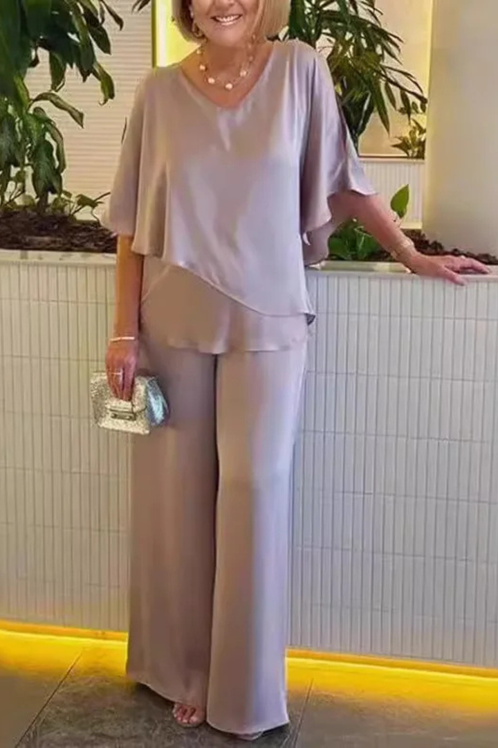 Versatile women's batwing sleeve top and wide leg trousers. Perfect coordinated casual wear set.