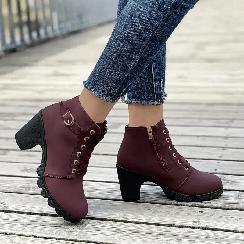 Black women's ankle boots, block heel for comfort & style. Chic buckle accent. Non-slip sole.