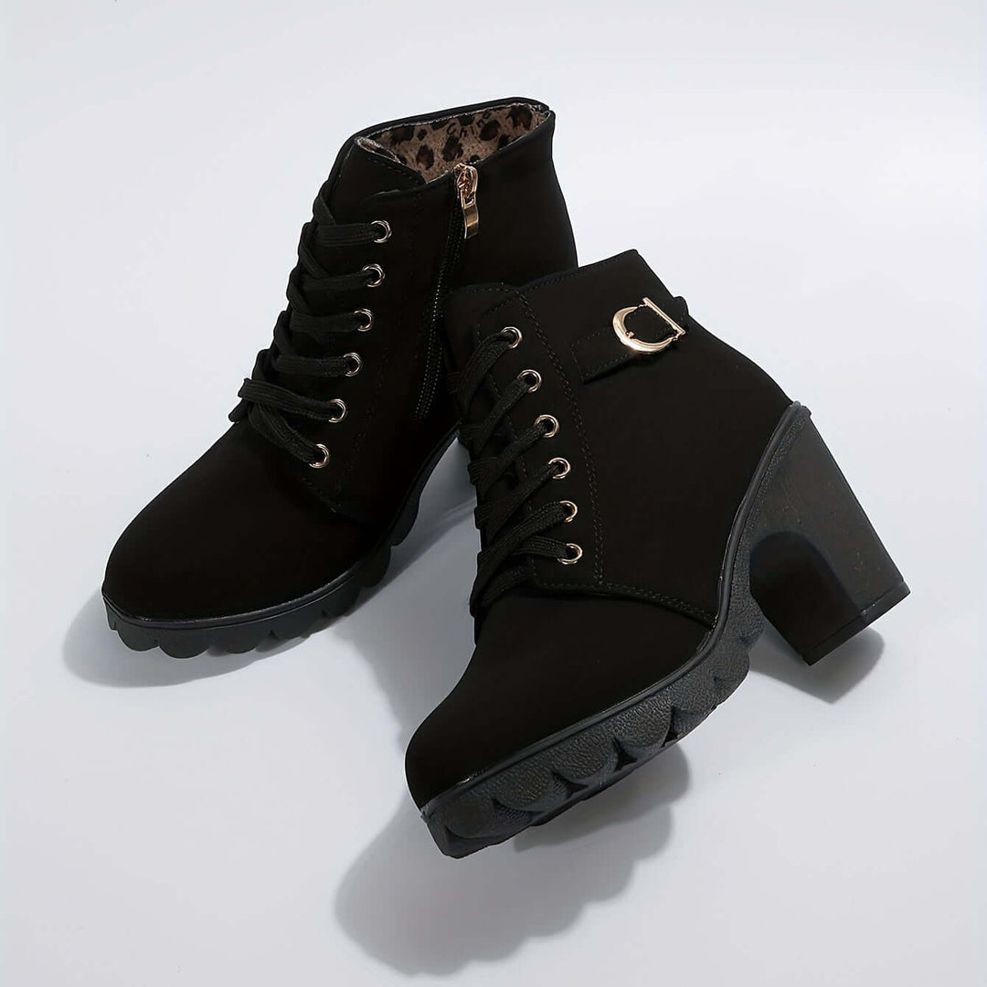 Chic red women's block heel ankle boots with elegant buckle. Stylish and comfortable footwear for autumn.