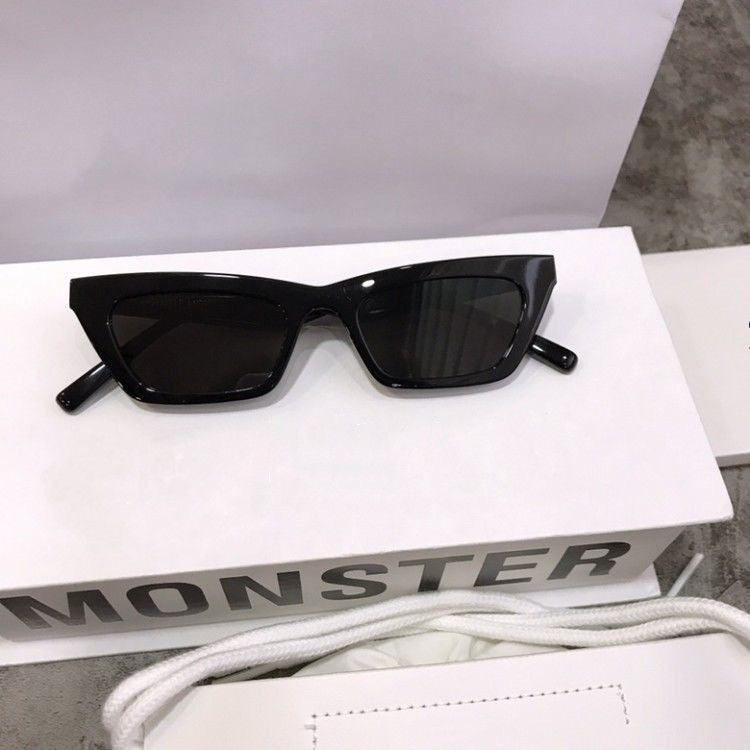 Women's chic black cat-eye sunglasses with UV protection, perfect for summer fashion.