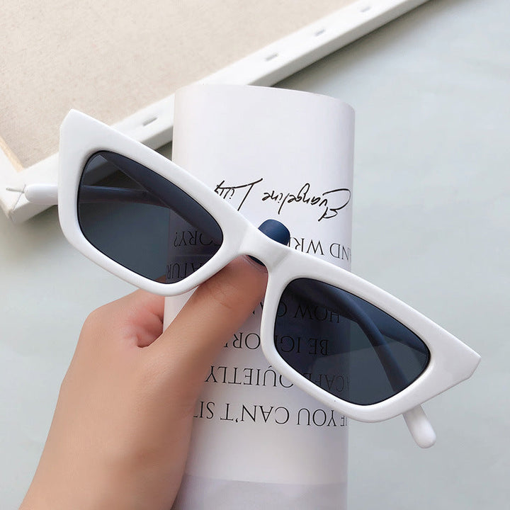 Modern cat-eye sunglasses with UV protection, designed for stylish women.