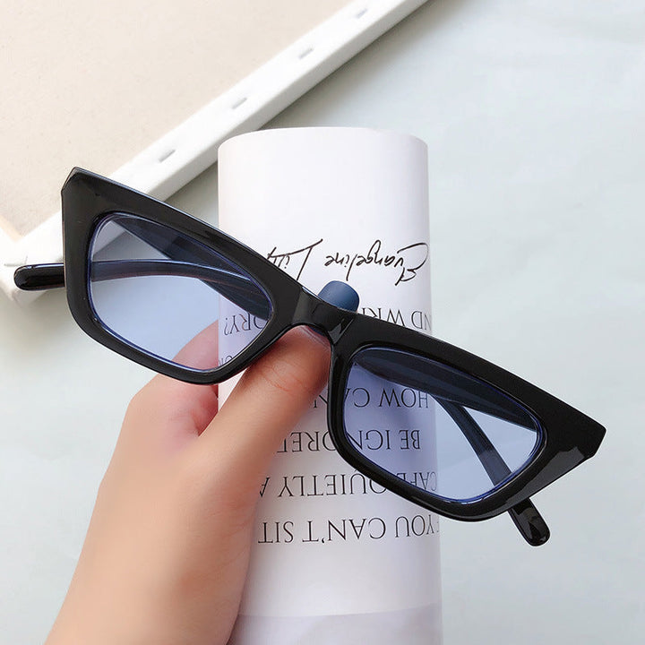 Women's designer cat-eye sunglasses, offering high UV protection and contemporary style.