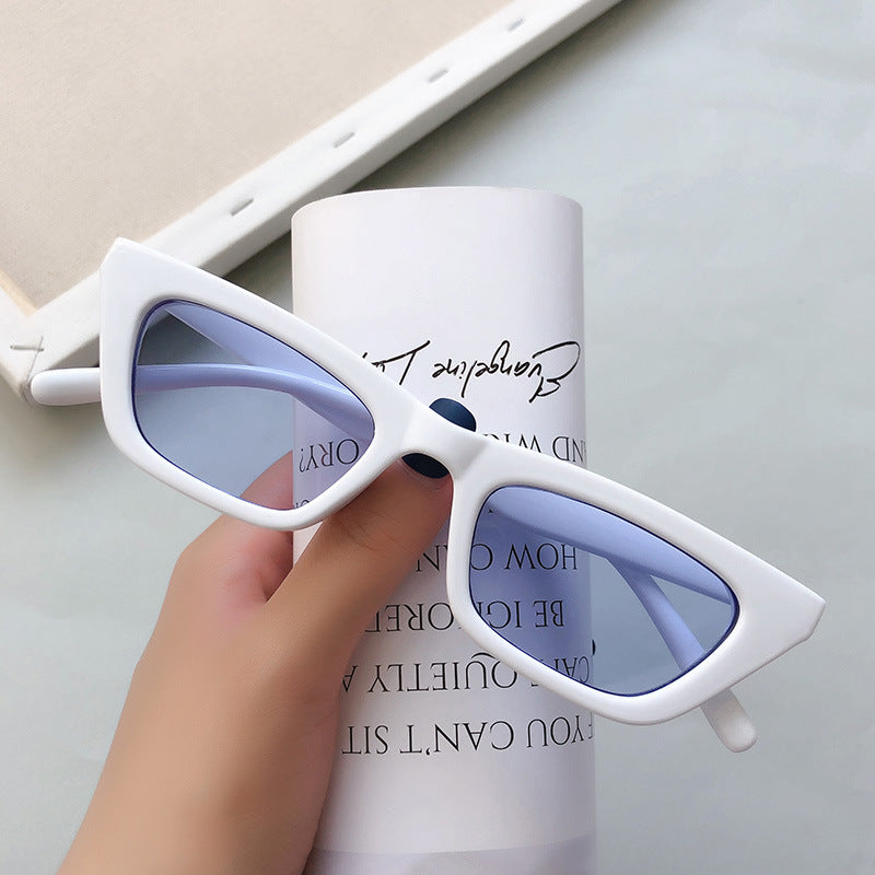 Chic women's cat-eye sunglasses offering full UV defense, combining style and protection.