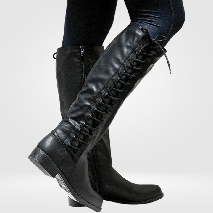 Stylish women's beige lace-up knee-high boots. Perfect for casual, western, or riding outfits.