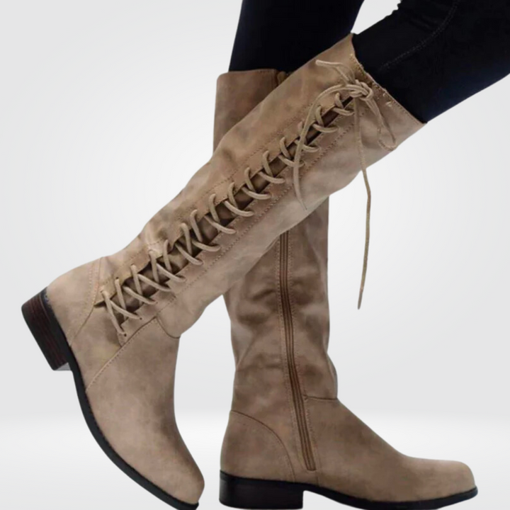 Fashion-forward women's brown lace-up knee-high boots with practical side zip. Chic and comfortable.