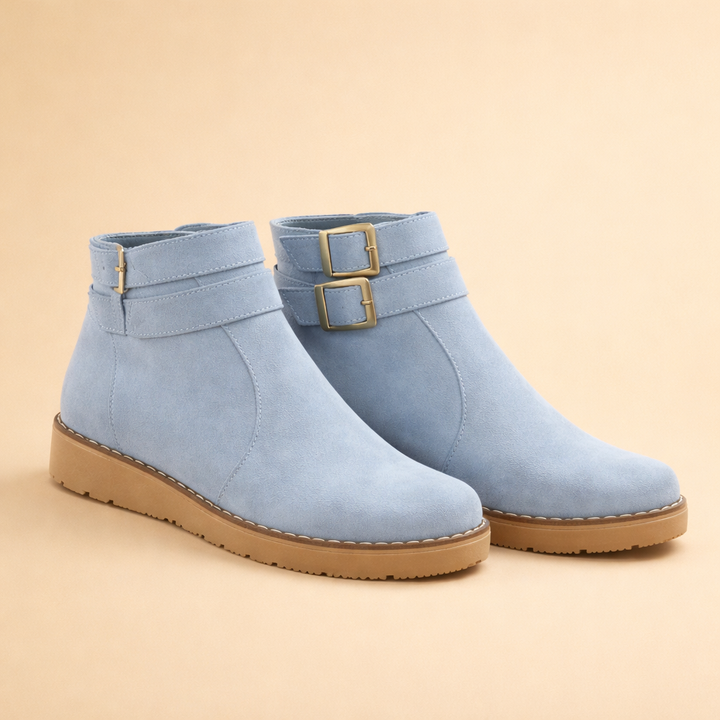 Versatile women's blue structured ankle boots, ideal for chic fall and winter outfits & stylish footwear.