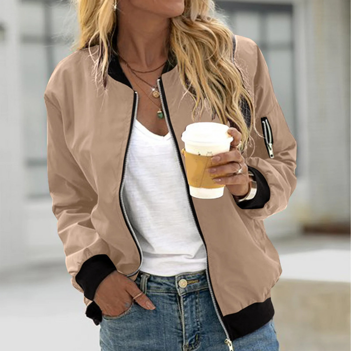 Modern women's chic bomber jacket, a versatile zip-up outerwear for effortless ladies' everyday style.