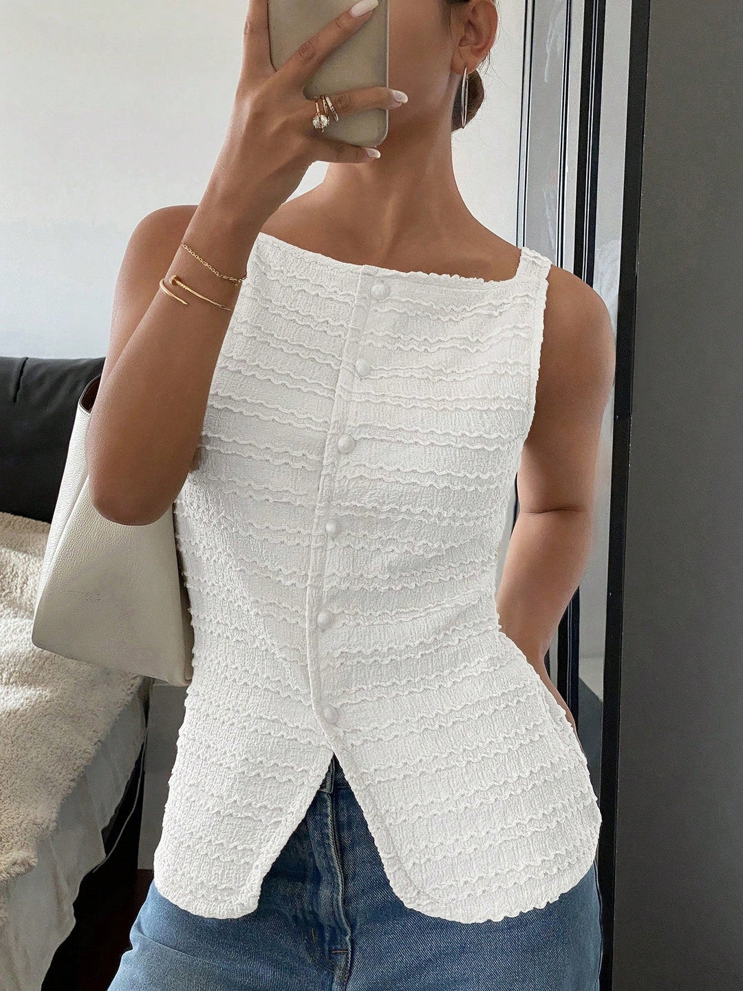 Women's chic button front sleeveless vest, perfect for elegant layering. Versatile outerwear for smart casual fashion.