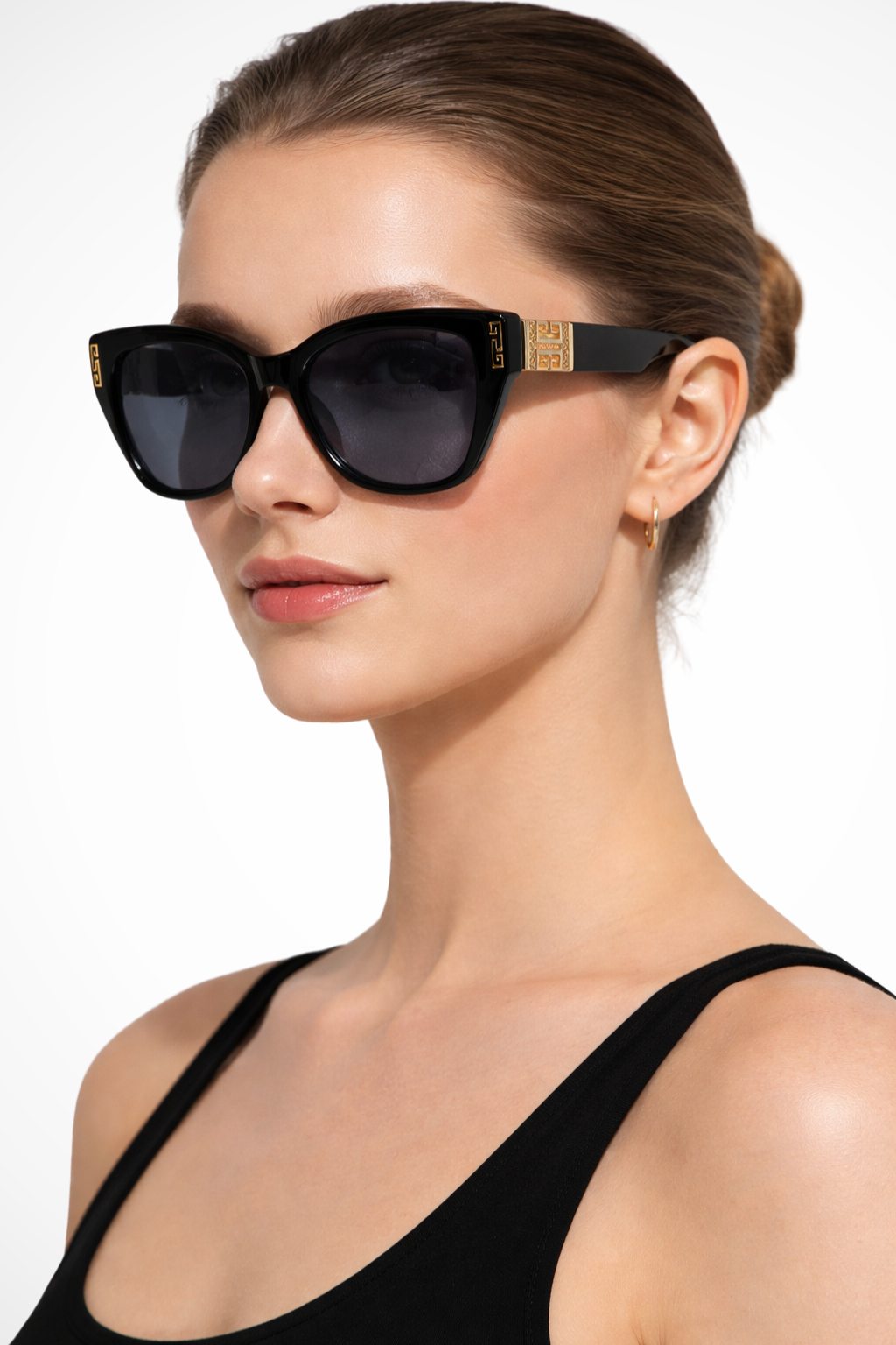 Stylish women's cat eye sunglasses, a trendy fashion accessory with luxurious gold detailing.
