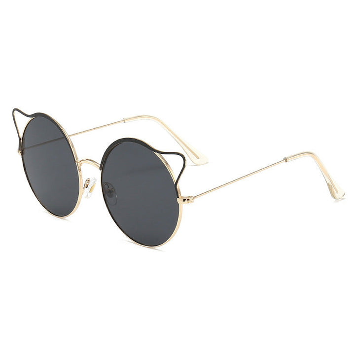 Fashion accessory: Women's cat-eye sunglasses with sleek mirrored lenses. Perfect for summer style.