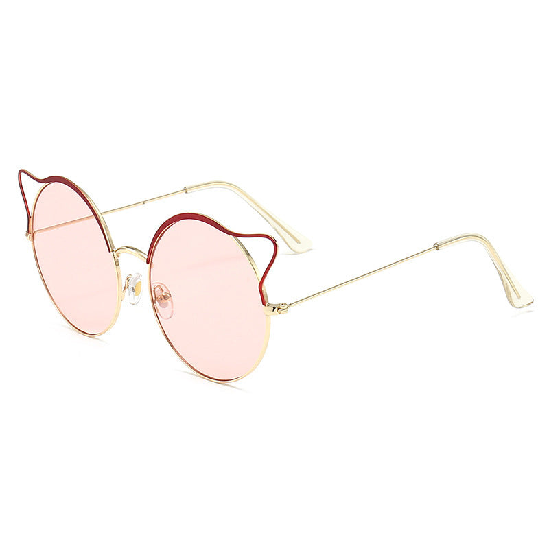 Women's cat-eye sunglasses with mirrored lenses, offering UV protection and a chic summer look.