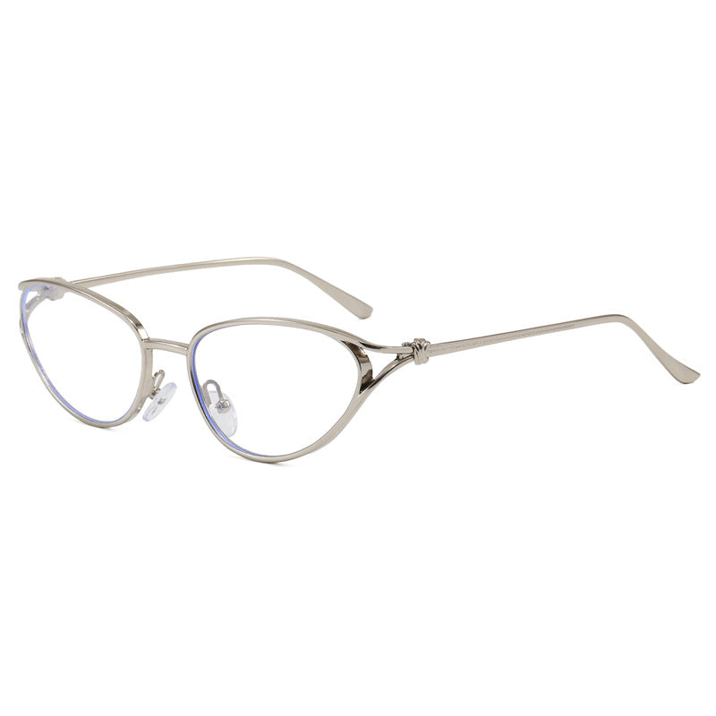 Detailed women's cat-eye sunglasses, intricate metallic frame design, for a truly chic fashion statement.