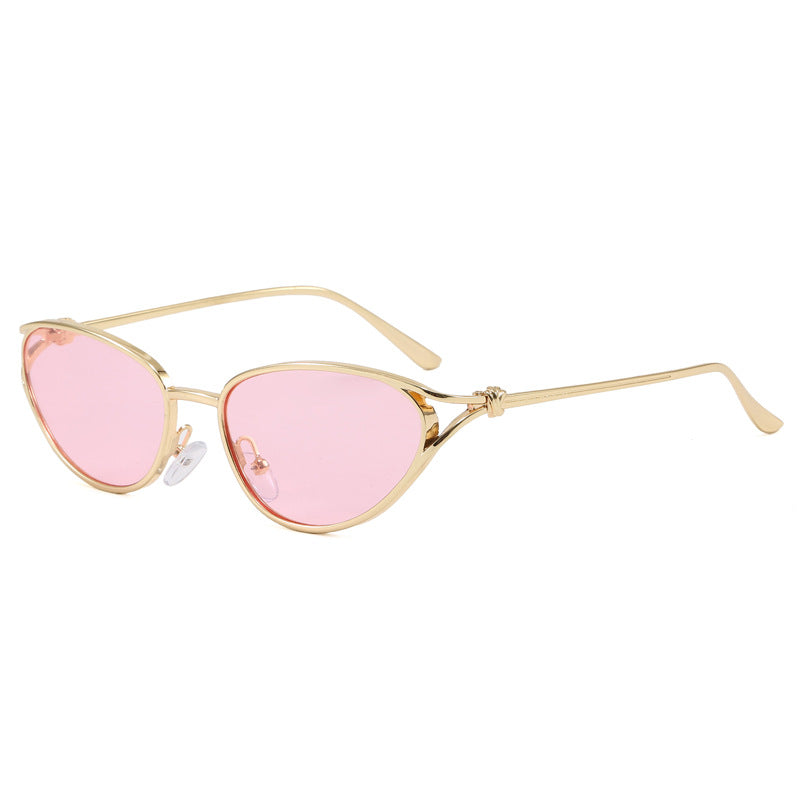 UV protective women's cat-eye sunglasses, trendy metallic frame, for both safety and style.