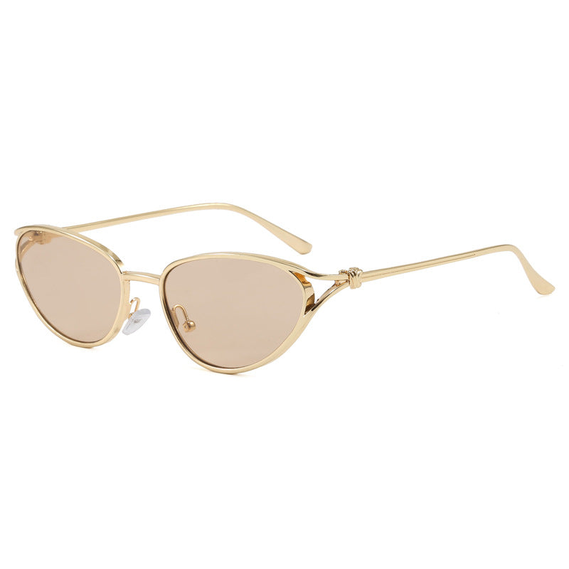 Versatile women's cat-eye sunglasses, sleek metallic frame, easily elevating any fashion look.