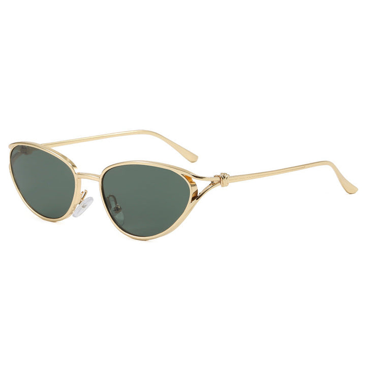 Modern women's cat-eye shades, stylish metallic frame, perfect for a contemporary fashion aesthetic.