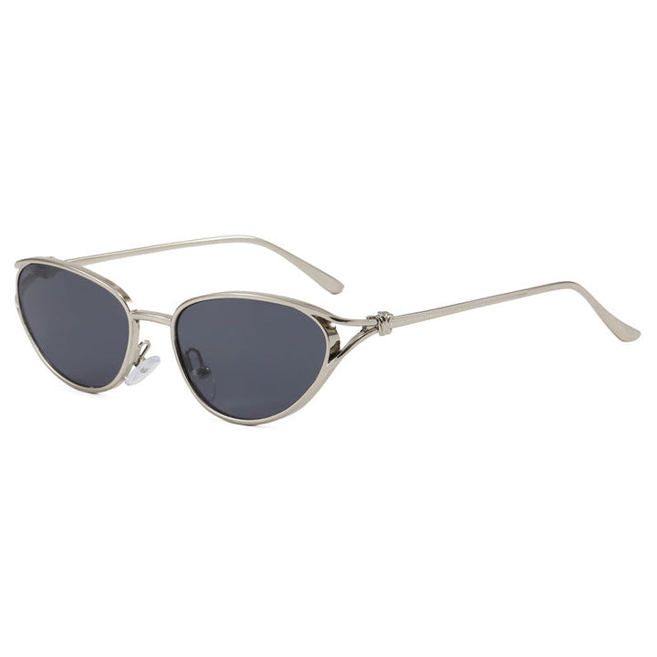 Trendy women's cat-eye sunglasses, elegant metallic frame for fashion-forward summer eyewear.
